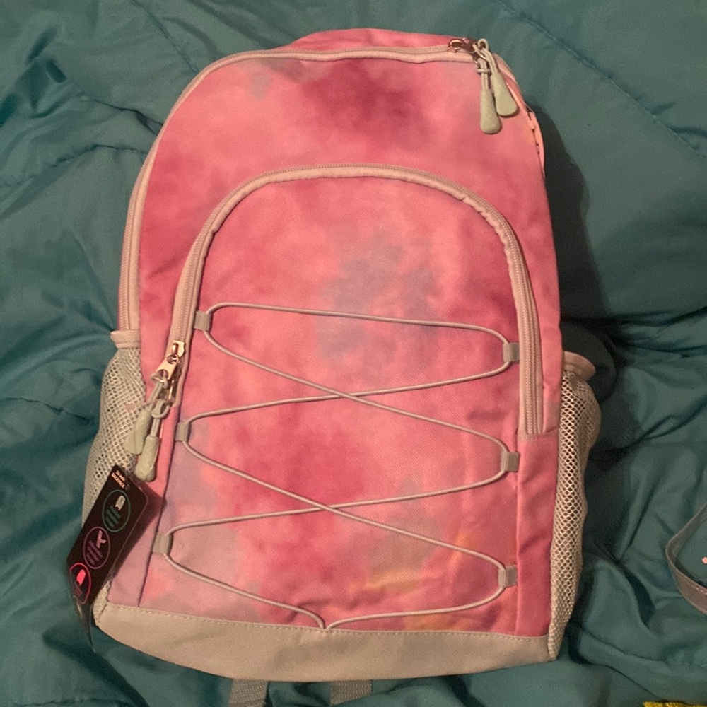 New tie dye backpack with side pockets! And laptop sleeve!